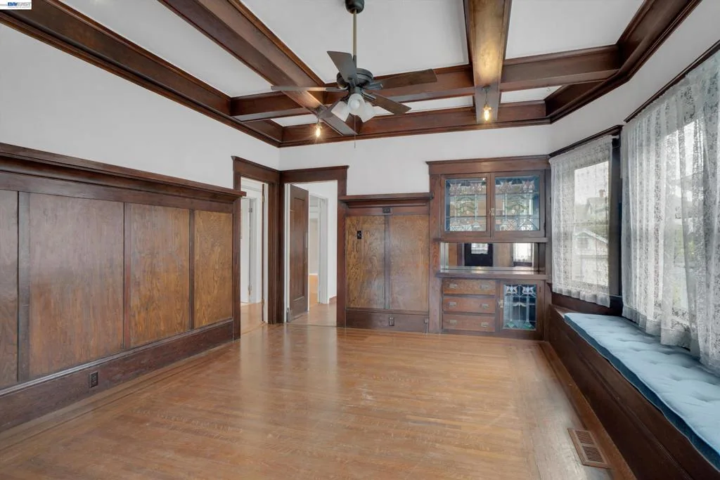 Formal dining room with original built-in cabinetry